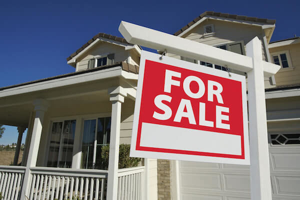 Sold Home For Sale Sign in Front of New House