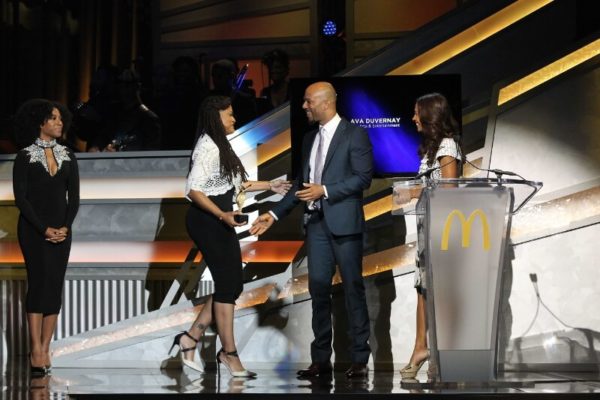 Hosted by Terrence &apos;J&apos; Jenkins and KeKe Palmer, the 12th annual 365Black Awards will premiere on BET Networks Sunday, August 23 at 9:00 p.m. EDT/8:00 p.m. CDT. Pictured, Academy award-nominated filmmaker, Ava DuVernay accepts award from actor/rapper, Common alongside actress, Salli Richardson Whitfield at the 12th annual 365Black Awards. </p><figcaption id=