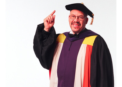 TomCapGown-Pointing-e1412978312266