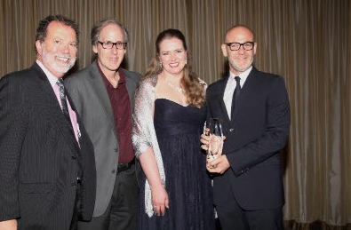 ><figcaption>SESAC’s Dennis Lord, composer Jeff Beal, SESAC’s Erin Collins and Netflix’s Peter Friedlander during the “Visionary Award” presentation</figcaption></figure>
<p>SESAC, the nation’s most innovative performing <strong>rights</strong> organization, honored its remarkable roster of top film and television composers with the annual sesac Film & Television Composers Awards Dinner. The invitation-only event which was held June 4 at the beautiful Casa Del Mar Hotel in Santa Monica, Calif., celebrated the composers of music featured in 2013’s biggest films, primetime television shows and cable programs.</p>
<p>The sesac event bestows awards to music composers in the categories of Network TV, Local TV, Cable TV, Film Composing and Jingles. sesac also acknowledged and honored composers for excellence in Streaming Music, marking the first time ever a <strong>PRO</strong> has acknowledged and awarded the music in streaming media outlets.</p>
<p>With more than 60 awards given during the evening, some of the industry’s most highly rated shows were honored, including Grey’s Anatomy, Mike & Molly, Save Me, Parenthood, Two And A Half Men, How I Met Your Mother and 2 <strong>Broke Girls</strong> among many others.</p>
<p>A major highlight of the evening was the presentation of the <strong>Visionary Award</strong> presentation to Netflix in recognition of “exceptional creativity and innovation in entertainment media.” Netflix, the world’s leading Internet television network with over 48 million <strong>members</strong> in more than 40 countries, was also cited for its original series, House of Cards, which features the music of sesac composer Jeff Beal.<br />(FOR MORE PHOTOS AND HONOREES CLICK NEXT)</p>
<p>&nbsp;</p>
<figure class=