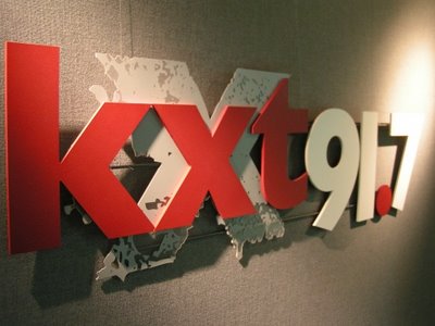 ><figcaption>MINOLTA DIGITAL CAMERA</figcaption></figure>
<p>VuHaus is proud to announce the addition of <strong>KXT</strong> 91.7 FM Dallas/Ft. Worth as a participating station in the VuHaus network. VuHaus (“view house”) is a non-profit collaboration of public radio’s leading music discovery stations that have joined together to build a video service so audiences can watch rare in-studio performances of emerging artists, one-of-a-kind interviews of their favorite musicians, and live performance streams, all housed under one roof.<strong>KXT</strong> 91.7 FM will join public radio stations WFUV in New York City, KCRW in Los Angeles, <strong>KEXP</strong> in Seattle, WXPN in Philadelphia, KUTX in Austin, and KTBG The Bridge in Kansas City. The VuHaus network of stations are the country’s leading engines for music discovery, constantly finding and handpicking artists and songs that will be household names soon. The contributing stations film local, emerging and established artists playing live music in their studios and on location, and these videos are then curated on the nationally-curated VuHaus mobile app and website. Each VuHaus station also curates their own local channel on the VuHaus site, giving fans a unique window into the country’s most vibrant music scenes.”Listeners turn to <strong>KXT</strong> 91.7 FM for a unique music experience,” said <strong>KXT</strong> Program Director Amy Miller. “Our partnership with VuHaus will expand the reach of the video content <strong>KXT</strong> 91.7 FM is already producing and bring our audience additional content they won’t find anywhere else. We’re excited to join such a well-respected group of stations in this collaboration.”Dallas has a great music scene, and <strong>KXT</strong> is at the heart of it. We are thrilled to add KXT, and the artists they support, to VuHaus,” comments Erik Langner, president of VuHaus. <strong>KXT</strong> 91.7 FM will be curating the VuHaus Dallas channel, and adding amazing footage from up and coming artists to the VuHaus archives, like exclusive solo acoustic version of “Lost in a Crowd” from Fantastic Negrito; Hozier’s “Take Me to Church,” performed on a bridge; Laura Marling’s “Strange,” shot for KXT’s On the Road series at SXSW; Violent Femmes “American Music;” Father John Misty “Bored in the USA;” and Brandi Carlile “The Eye.”VuHaus, which received initial funding from the Corporation for Public Broadcasting, will announce the addition of more stations soon.</p>

    <div class=